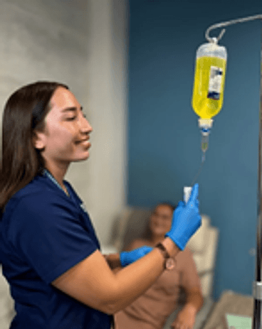 Nurse preparing an intravenous chelation infusion